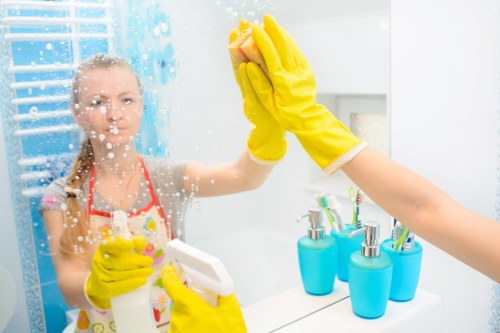 Deep cleaning a bathroom during move out cleaning